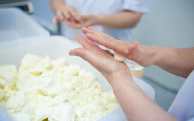 The dough is then kneaded by hand to form balls that can be rolled in spices, and then jarred with oil.