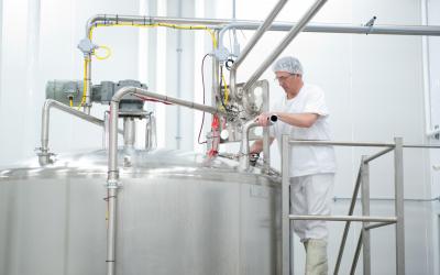 The milk is transferred into the mixing tank, to which is added milk powder,